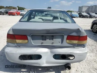 1997 Honda Civic EX z VIN 1HGEJ8143VL043998, wystawiony jako Copart lot #51795345 z przebiegiem 129 631 mil mil oraz Nie do naprawy • Non repairable. Historia ofert i sprzedaży dostępna na DreamBid. Obrazek 6.