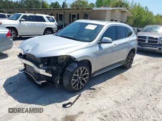 2021 BMW X1 sDrive28i with VIN WBXJG7C06M5T14235, listed as a IAAI auction lot 42021762 with 53,384 mi miles and . Bid and sale history available at DreamBid. Image 2.