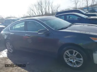 2009 Acura TL Tech with VIN 19UUA86579A018035, listed as a IAAI auction lot 41875207 with 266,770 mi miles. Bid and sale history available at carsss.com. Image 13.