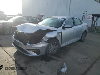 2020 Kia Optima LX z VIN 5XXGT4L30LG389034, wystawiony jako Copart lot #49735975 z przebiegiem 219 985 mil mil oraz Szkoda całkowita • Salvage title. Historia ofert i sprzedaży dostępna na DreamBid. Obrazek 1.