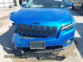 2021 Jeep Cherokee Altitude with VIN 1C4PJLLB6MD134228, listed as a IAAI auction lot 41501177 with 63,357 mi miles. Bid and sale history available at carsss.com. Image 13.