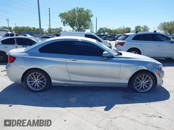 2015 BMW 2 Series 228i with VIN WBA1F5C58FV257570, listed as a IAAI auction lot 41783929 with 229,893 mi miles. Bid and sale history available at carsss.com. Image 13.