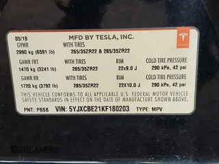 2019 Tesla Model X 75D with VIN 5YJXCBE21KF180203, listed as a IAAI auction lot 42190255 with 114,294 mi miles and . Bid and sale history available at carsss.com. Image 9.