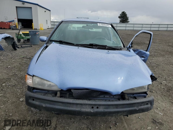 1995 Ford Contour z VIN 1FALP65L7SK244644, wystawiony jako Copart lot #51668445 z przebiegiem 100 085 mil mil oraz Szkody całkowita. Historia ofert i sprzedaży dostępna na DreamBid. Obrazek 5.