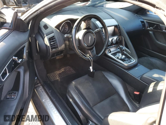 2014 Jaguar F-Type V6 with VIN SAJWA6E73E8K09923, listed as a Copart auction lot 79718124 with 122,526 mi miles and Clean Title. Bid and sale history available at DreamBid. Image 8.