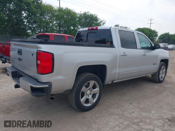 2018 Chevrolet Silverado 1500 LT with VIN 3GCPCREC8JG645232, listed as a IAAI auction lot 41927715 with 95,601 mi miles and . Bid and sale history available at DreamBid. Image 4.