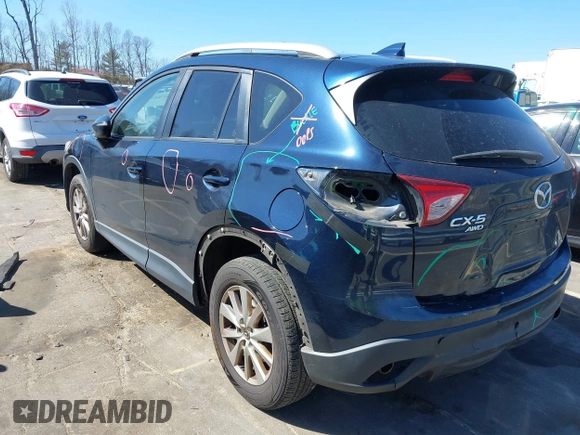 2016 Mazda CX-5 Touring with VIN JM3KE4CY0G0631786, listed as a IAAI auction lot 41761214 with 220,058 mi miles. Bid and sale history available at carsss.com. Image 6.