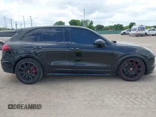 2014 Porsche Cayenne GTS with VIN WP1AD2A25ELA71350, listed as a IAAI auction lot 42031766 with 104,184 mi miles and . Bid and sale history available at DreamBid. Image 13.