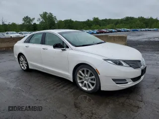 2015 Lincoln MKZ z VIN 3LN6L2J9XFR605027, wystawiony jako Copart lot #57724605 z przebiegiem 76 845 mil mil oraz Czysty tytuł • Clean title. Historia ofert i sprzedaży dostępna na DreamBid. Obrazek 4.