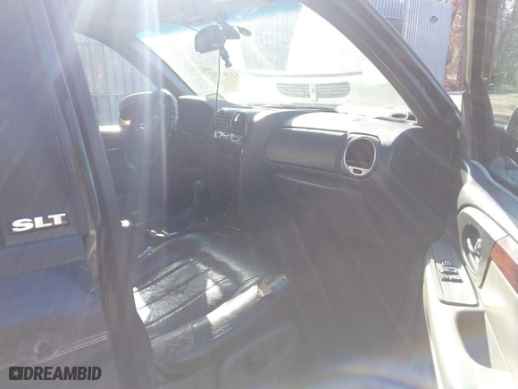 2003 GMC Envoy XL SLT with VIN 1GKET16S636121620, listed as a IAAI auction lot 41197711 with 225,866 mi miles. Bid and sale history available at carsss.com. Image 5.