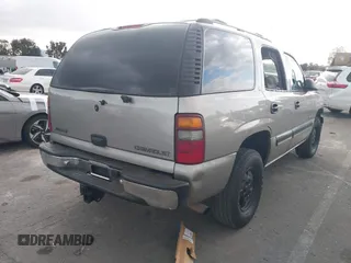 2001 Chevrolet Tahoe LS z VIN 1GNEC13T71R199027, wystawiony jako IAAI lot #41546283 z przebiegiem 232 905 mil mil oraz . Historia ofert i sprzedaży dostępna na DreamBid. Obrazek 4.