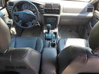 2004 Isuzu Rodeo z VIN 4S2DM58Y144302204, wystawiony jako Copart lot #59227675 z przebiegiem 98 998 mil mil oraz Czysty tytuł • Clean title. Historia ofert i sprzedaży dostępna na DreamBid. Obrazek 8.