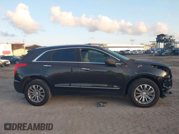 2019 Cadillac XT5 Luxury FWD with VIN 1GYKNCRS6KZ253400, listed as a IAAI auction lot 41984279 with 55,412 mi miles and . Bid and sale history available at DreamBid. Image 13.