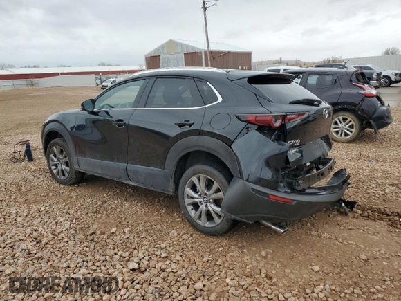 2023 Mazda CX-30 S Select with VIN 3MVDMBBM0PM562276, listed as a Copart auction lot 50411225 with 4,516 mi miles and Salvage title. Bid and sale history available at DreamBid. Image 2.