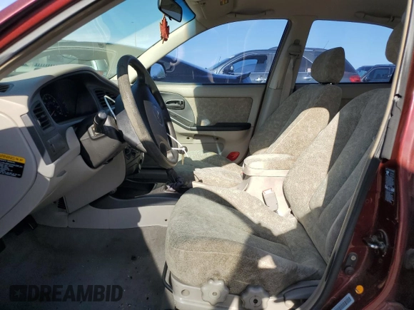 2001 Hyundai Elantra GLS z VIN KMHDN45D41U107399, wystawiony jako Copart lot #52658745 z przebiegiem 65 459 mil mil oraz Szkoda całkowita • Salvage title. Historia ofert i sprzedaży dostępna na DreamBid. Obrazek 7.