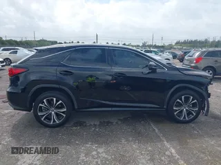 2020 Lexus RX 350 with VIN 2T2HZMAA9LC153571, listed as a IAAI auction lot 41710981 with 34,354 mi miles and . Bid and sale history available at DreamBid. Image 13.