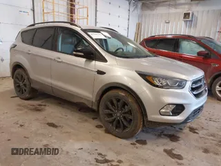 2017 Ford Escape Titanium with VIN 1FMCU9J94HUD92984, listed as a IAAI auction lot 41708720 with 176,550 mi miles. Bid and sale history available at carsss.com. Image 1.