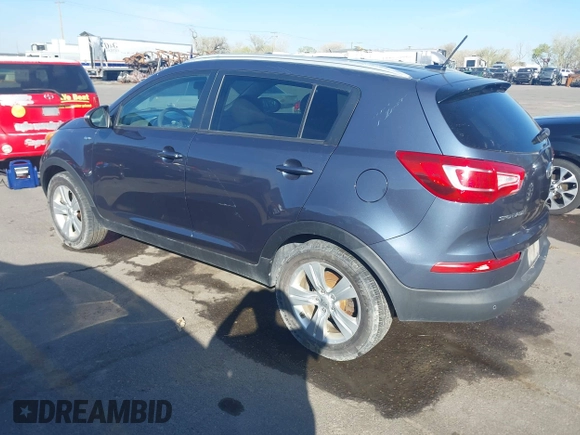 2012 Kia Sportage LX with VIN KNDPBCA28C7273676, listed as a IAAI auction lot 42034764 with 121,527 mi miles and . Bid and sale history available at DreamBid. Image 3.