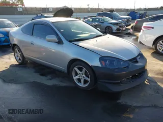 2004 Acura RSX with VIN JH4DC54864S020137, listed as a IAAI auction lot 41419990 with 195,509 mi miles. Bid and sale history available at carsss.com. Image 1.