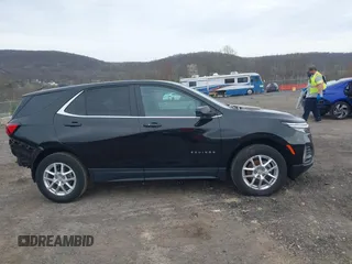 2023 Chevrolet Equinox LT with VIN 3GNAXUEG9PL268580, listed as a IAAI auction lot 42062217 with 30,306 mi miles and . Bid and sale history available at DreamBid. Image 14.