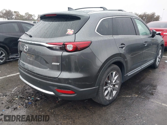 2019 Mazda CX-9 Grand Touring with VIN JM3TCADY4K0315095, listed as a IAAI auction lot 41573317 with 64,635 mi miles. Bid and sale history available at carsss.com. Image 4.