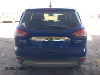2016 Ford Escape Titanium with VIN 1FMCU9JXXGUB58961, listed as a IAAI auction lot 41772977 with 122,665 mi miles. Bid and sale history available at carsss.com. Image 16.