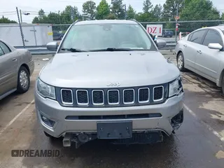 2021 Jeep Compass Limited with VIN 3C4NJCCB0MT573569, listed as a IAAI auction lot 42301154 with 106,812 mi miles and . Bid and sale history available at DreamBid. Image 12.