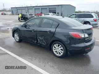 2012 Mazda 3 i Grand Touring with VIN JM1BL1W70C1657521, listed as a IAAI auction lot 41994605 with 165,912 mi miles and . Bid and sale history available at DreamBid. Image 3.