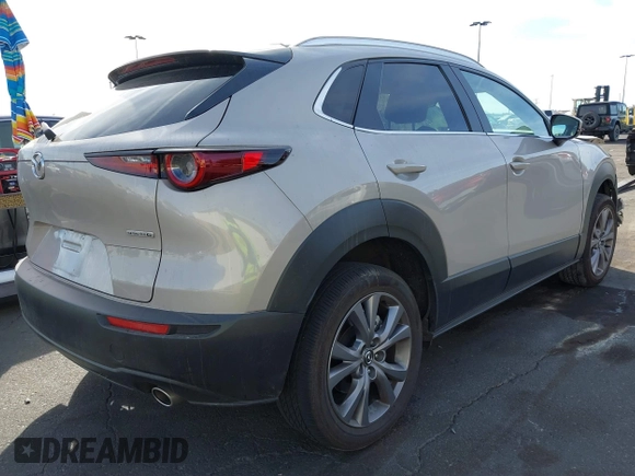 2024 Mazda CX-30 S Preferred with VIN 3MVDMBCM7RM638304, listed as a IAAI auction lot 41396590 with 15,702 mi miles and . Bid and sale history available at DreamBid. Image 4.