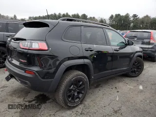 2022 Jeep Cherokee Trailhawk with VIN 1C4PJMBX3ND502322, listed as a Copart auction lot 85561444 with 57,630 mi miles and Salvage Title. Bid and sale history available at carsss.com. Image 3.