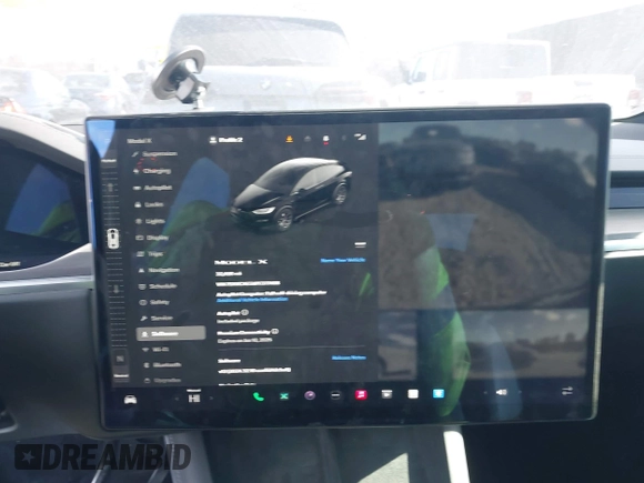 2023 Tesla Model X with VIN 7SAXCAE59PF377408, listed as a IAAI auction lot 41176738 with 32,496 mi miles and . Bid and sale history available at DreamBid. Image 18.