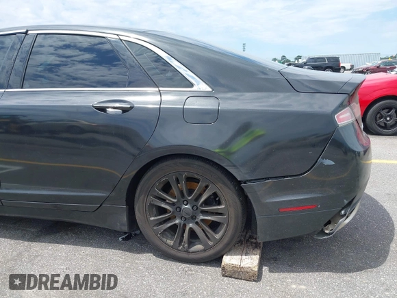2013 Lincoln MKZ z VIN 3LN6L2GK1DR800859, wystawiony jako IAAI lot #42347695 z przebiegiem 193 300 mil mil oraz . Historia ofert i sprzedaży dostępna na DreamBid. Obrazek 14.