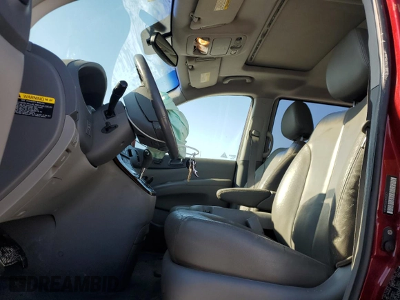 2007 Kia Sedona LX with VIN KNDMB233576160217, listed as a Copart auction lot 88878765 with 188,835 mi miles and Salvage Title. Bid and sale history available at carsss.com. Image 7.