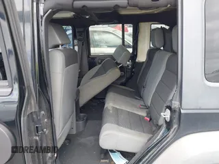 2007 Jeep Wrangler Unlimited X with VIN 1J4GB391X7L172965, listed as a IAAI auction lot 42040337 with 170,482 mi miles and . Bid and sale history available at DreamBid. Image 8.