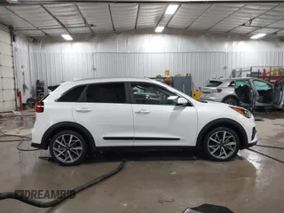 2021 Kia Niro Touring with VIN KNDCC3LC3M5463514, listed as a IAAI auction lot 41564596 with 29,063 mi miles. Bid and sale history available at carsss.com. Image 13.
