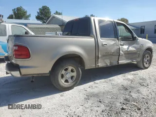 2002 Ford F-150 XLT with VIN 1FTRW07L22KB89313, listed as a Copart auction lot 76680834 with 377,443 mi miles and Salvage Title. Bid and sale history available at DreamBid. Image 3.