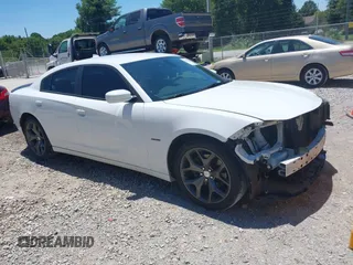 2015 Dodge Charger RT with VIN 2C3CDXCT1FH915822, listed as a IAAI auction lot 39717306 with 167,418 mi miles and . Bid and sale history available at DreamBid. Image 1.