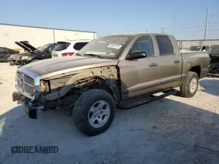 2007 Dodge Dakota SLT z VIN 1D7HE48K77S124191, wystawiony jako Copart lot #70031973 z przebiegiem 58 239 mil mil oraz Szkoda całkowita • Salvage title. Historia ofert i sprzedaży dostępna na DreamBid. Obrazek 1.