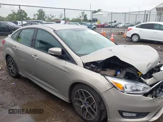 2016 Ford Focus SE z VIN 1FADP3F26GL359178, wystawiony jako IAAI lot #42621974 z przebiegiem 24 999 mil mil oraz . Historia ofert i sprzedaży dostępna na DreamBid. Obrazek 1.