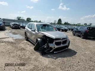 2021 BMW X1 xDrive28i with VIN WBXJG9C09M5S52289, listed as a Copart auction lot 64413105 with Not provided miles and Salvage title. Bid and sale history available at DreamBid. Image 14.