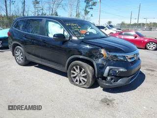2019 Honda Pilot EX-L with VIN 5FNYF6H54KB031938, listed as a IAAI auction lot 41685323 with 129,254 mi miles. Bid and sale history available at carsss.com. Image 1.