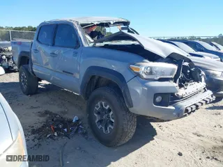 2019 Toyota Tacoma 4WD SR with VIN 3TMCZ5AN5KM199346, listed as a IAAI auction lot 41678090 with 1 mi miles. Bid and sale history available at carsss.com. Image 1.