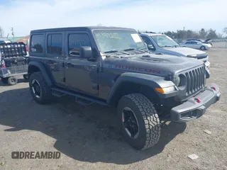 2020 Jeep Wrangler Unlimited Rubicon z VIN 1C4HJXFG0LW108844, wystawiony jako IAAI lot #41737307 z przebiegiem 56 959 mil mil oraz . Historia ofert i sprzedaży dostępna na DreamBid. Obrazek 1.