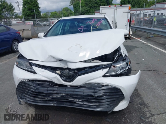 2019 Toyota Camry LE z VIN 4T1B11HKXKU237605, wystawiony jako IAAI lot #42248386 z przebiegiem 70 235 mil mil oraz . Historia ofert i sprzedaży dostępna na DreamBid. Obrazek 12.