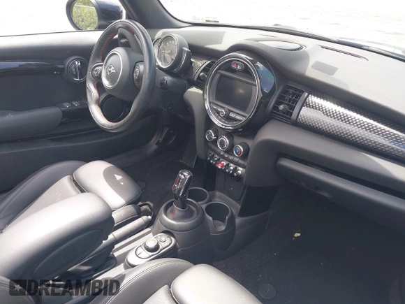 2021 MINI Convertible Cooper S z VIN WMWWJ5C0XM3M08622, wystawiony jako IAAI lot #42507679 z przebiegiem 36 932 mil mil oraz . Historia ofert i sprzedaży dostępna na DreamBid. Obrazek 5.