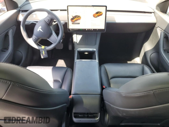 2022 Tesla Model Y Long Range z VIN 7SAYGDEE2NF513823, wystawiony jako Copart lot #51174795 z przebiegiem 28 143 mil mil oraz Szkody całkowita. Historia ofert i sprzedaży dostępna na DreamBid. Obrazek 8.