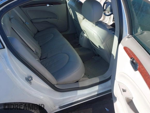 2007 Buick Lucerne V6 CXL with VIN 1G4HD57297U130868, listed as a IAAI auction lot 41749873 with 144,056 mi miles. Bid and sale history available at carsss.com. Image 8.