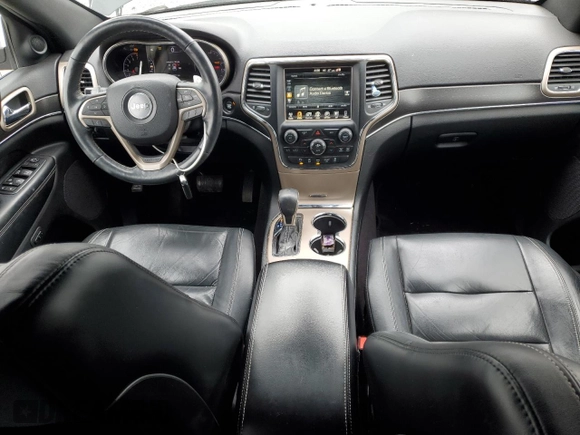 2017 Jeep Grand Cherokee Limited 75th Anniversary with VIN 1C4RJFBG1HC683371, listed as a Copart auction lot 45853175 with 142,277 mi miles and Salvage title. Bid and sale history available at DreamBid. Image 8.
