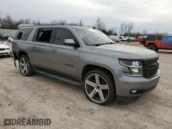 2015 Chevrolet Suburban LT with VIN 1GNSCJKC4FR263844, listed as a Copart auction lot 49231755 with Not provided miles and Salvage title. Bid and sale history available at DreamBid. Image 4.