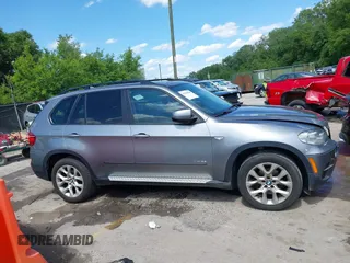 2012 BMW X5 35i z VIN 5UXZV4C50CL989684, wystawiony jako IAAI lot #42284840 z przebiegiem 134 056 mil mil oraz . Historia ofert i sprzedaży dostępna na DreamBid. Obrazek 13.
